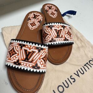 Louis Vuitton sandals with orange and black pattern